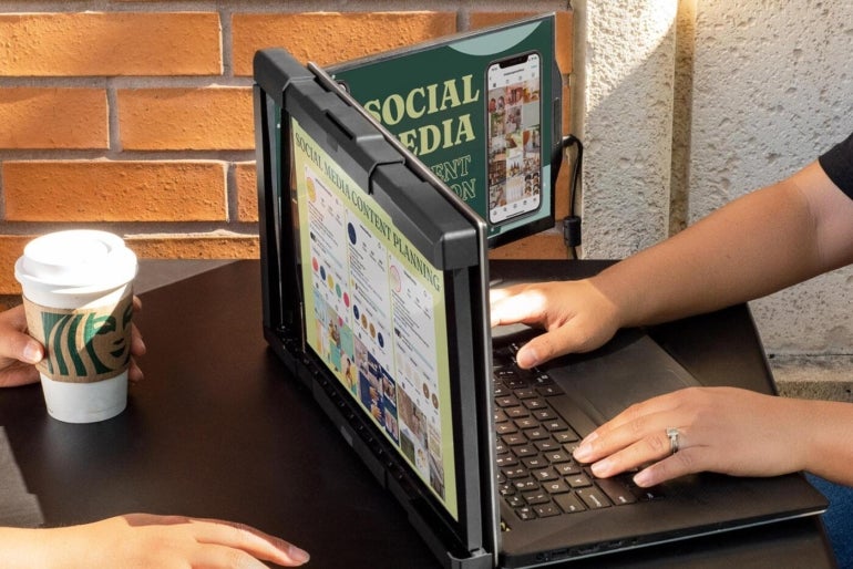 A person working on a laptop.