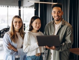 Stock photo of young business professionals in an office.