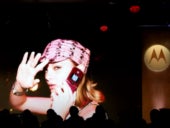 A girl using a Motorola smartphone.