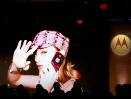 A girl using a Motorola smartphone.
