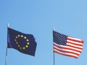 Flags of Europe and USA next to each other.