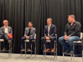 Stramski 2nd from right speaking at Pure Accelerate 2025.