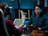 Girl Holding Tablet Working on VR Tech