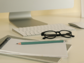 Concept of workplace with modern desktop computer on white table by AtlasComposer