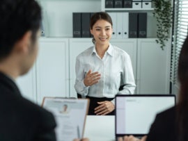 Asian beautiful woman talk with hr manager for job interview in office.
