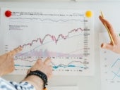Colleagues working on a sales report
