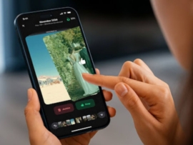 Woman editing image using mobile phone.