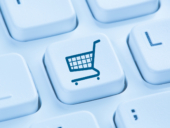 A shopping cart icon placed on a keycap.