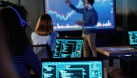 Male business trainer is against projector with data, teaching people