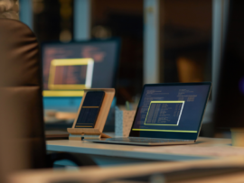 Workplace with gadgets in IT office