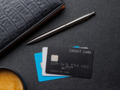 Black credit card on office table