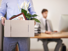 Cropped shot of a businessman leaving work as hes being replaced by a new employee.