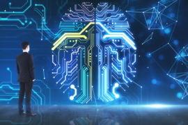 Machine learning concept with businessman looking at digital screen with circuit human brain.