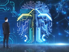 Machine learning concept with businessman looking at digital screen with circuit human brain.