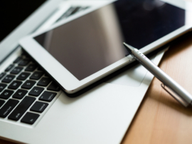 Working desk with laptop computer and tablet pc