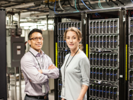 Technicians in a large computer server farm.