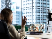 A woman in video business conference