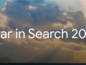 A cloudy sky with the word that says "Year in Search 2025".