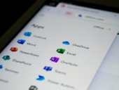 A close up of a cell phone screen with different app icons.