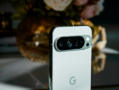 A close up of a cell phone on a table.