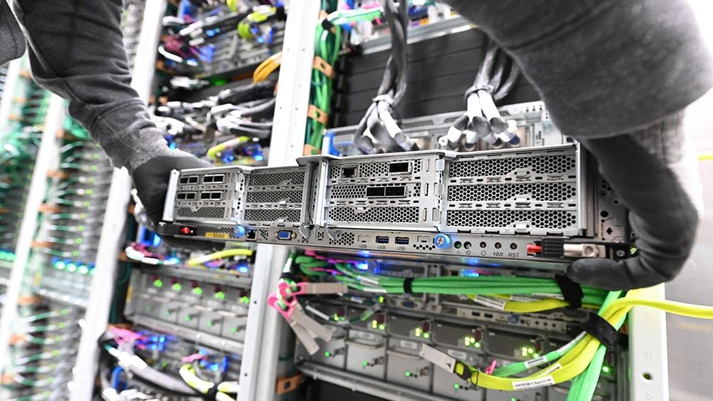 A man holding a data center.