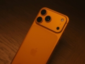orange smartphone with triple camera