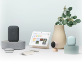 A collection of Google Nest smart home devices arranged in a minimalist home decor setting.