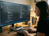 A person working on a computer code