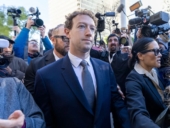 Mark Zuckerberg being mobbed by the media.