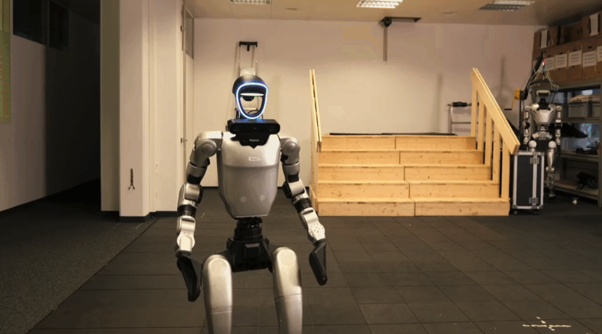GIF of a humanoid robot climbing up and down the stairs.