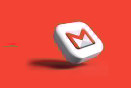 A Google Gmail icon on a white block with red background.